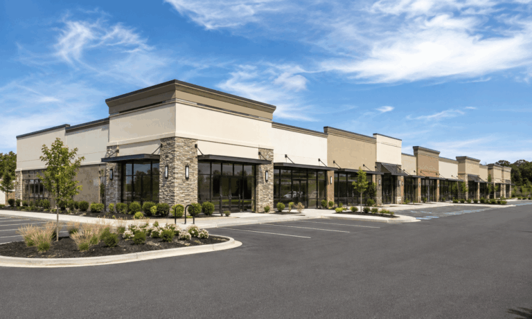 Retail property with multiple storefronts and landscaped parking areas